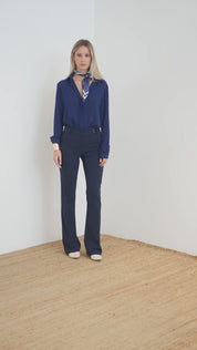 Technical flared trousers